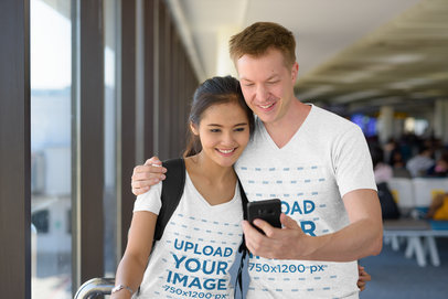 Mockup of a Couple Wearing Heathered V-Neck T-Shirts 41316-r-el2