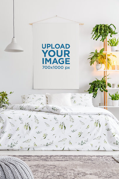 Mockup of an Art Print Hanging Over a Comfy Bed 