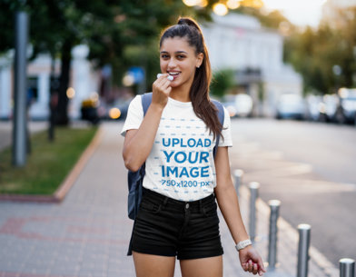 T-shirt Mockup of a Young Female Student Applying Lipstick 41374-r-el2