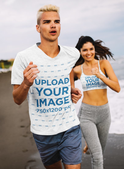 T-Shirt Mockup of a Young Man Jogging at the Beach with a Woman in a Sports Bra
