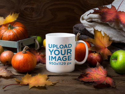 Mockup of an 11 oz Coffee Mug Surrounded by Fall Decorations 