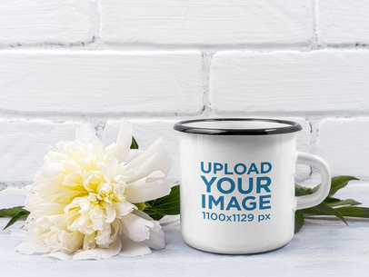 Mockup Featuring an Enamel Mug Placed by a Flower 