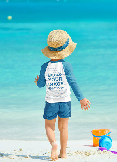Back View Raglan Long Sleeve Tee Mockup Featuring a Boy at a Tropical Beach