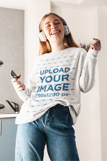 Sweatshirt Mockup of a Happy Woman Singing and Dancing