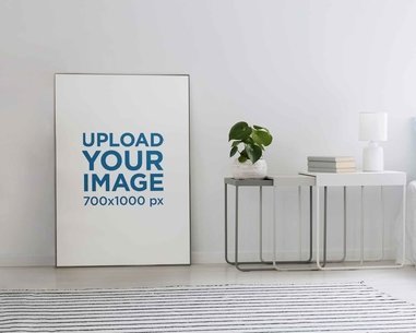 Mockup of an Art Print Placed on a Bedroom's Floor