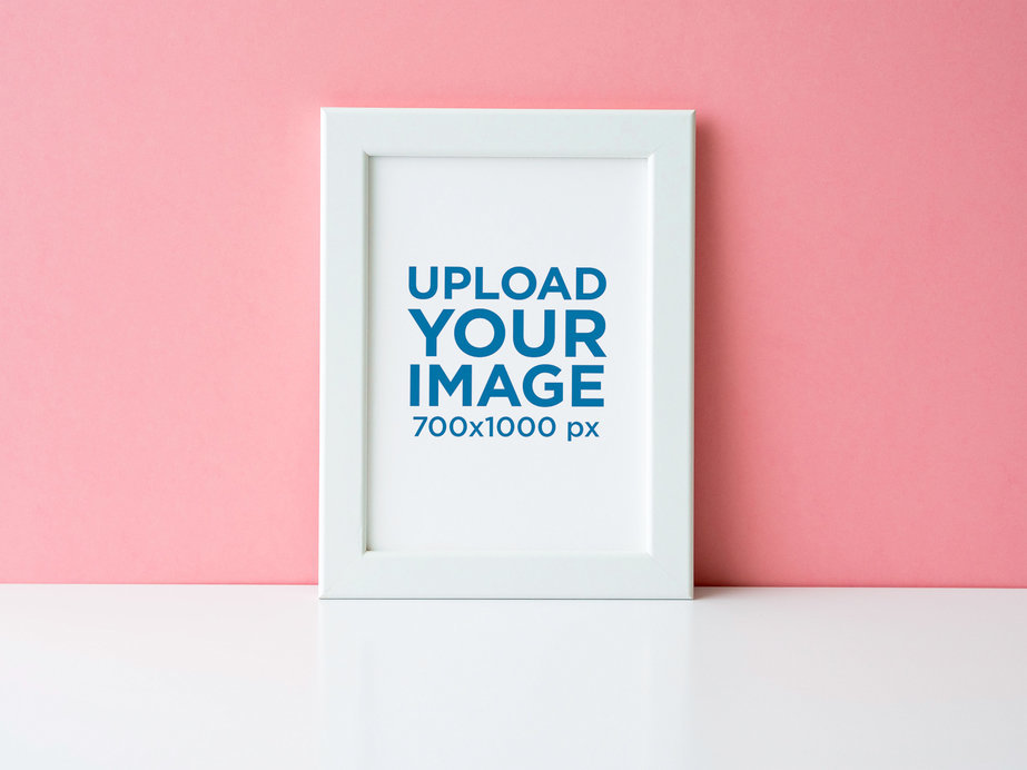 Mockup of an Art Print Leaning on a Pink Wall