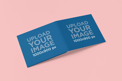 Mockup of an Open Digipak Placed on a Flat Color Surface