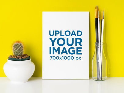 Art Print Mockup Placed Next to a Vase of Paint Brushers 36009-r-el2