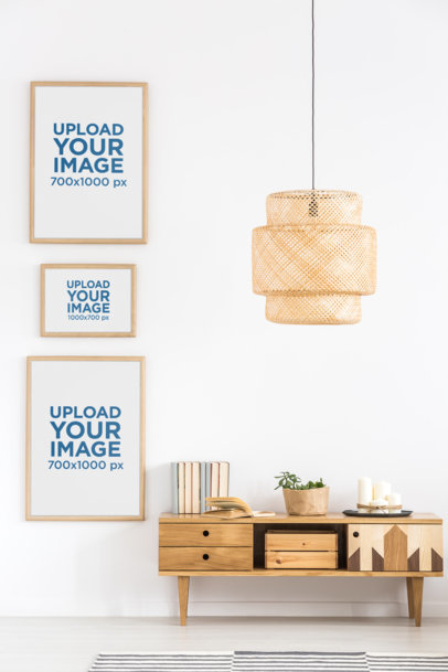 Mockup Featuring Three Framed Art Prints Hanging in a Modern Apartment 