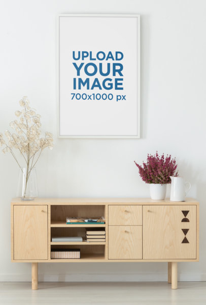 Mockup of an Art Print Placed by Decorative Flowers 38893-r-el2