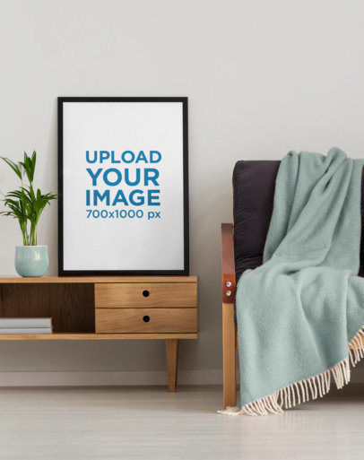 Art Print Mockup Featuring Wooden Furniture and a Cozy Sofa