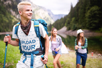 T-Shirt Mockup of a Fully Equipped Hiker on the Mountains