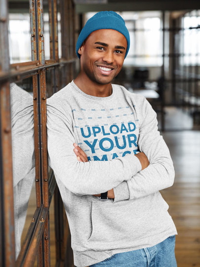 Heather Crewneck Sweatshirt Mockup Featuring a Happy Young Man With Crossed Arms 