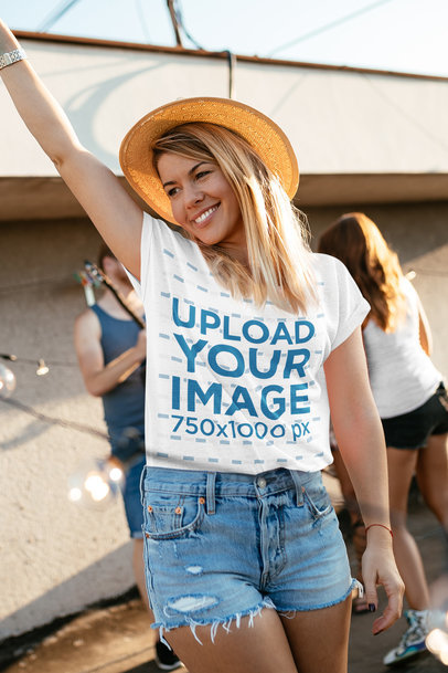 T-Shirt Mockup Featuring a Woman at a Party