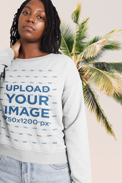 Sweatshirt Mockup of a Woman Posing Near a Palm Tree 42555