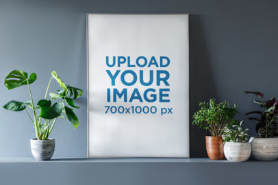 Mockup of an Art Print Surrounded by Several Indoor Plants
