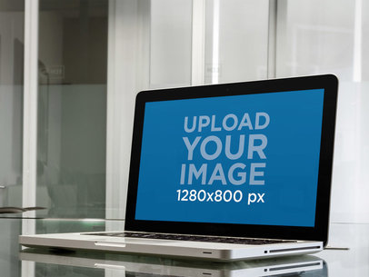 Mockup of a Macbook Pro in a Business Room