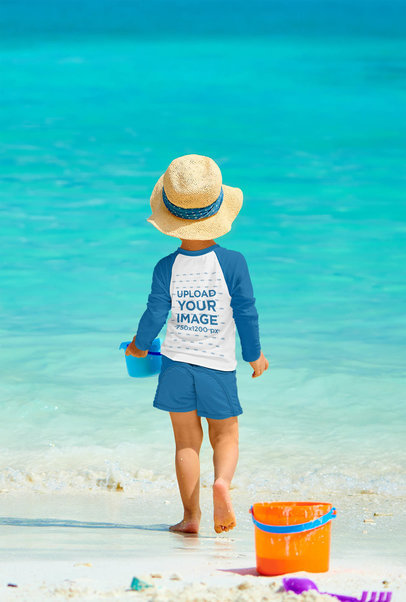 Back View of a Boy Wearing a Raglan Long Sleeve Tee by the Beach 
