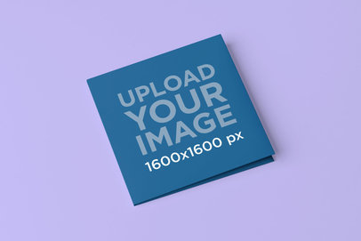 Digipak Mockup Featuring a Plain Color Background 