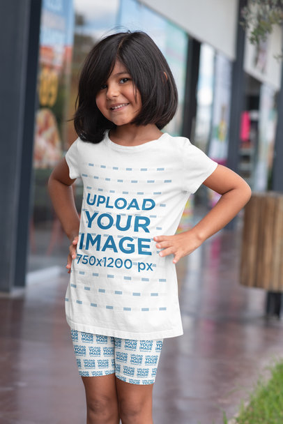 T-Shirt Mockup of a Little Girl Wearing Bike Shorts