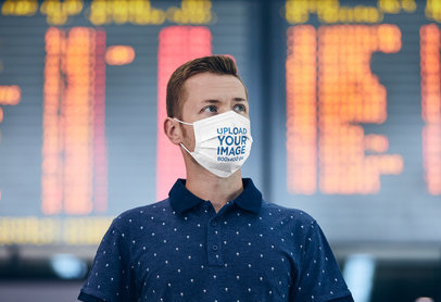 Mockup of a Man Wearing a Face Mask at an Airport Terminal