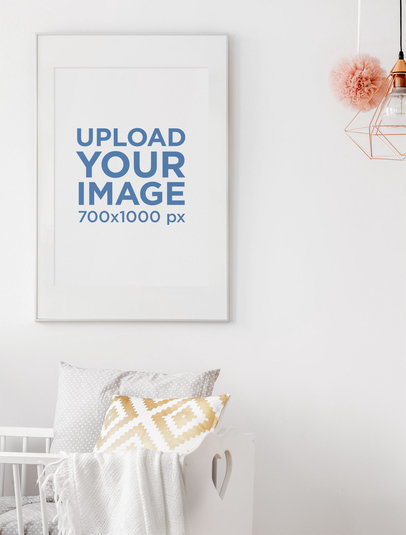 Mockup Featuring a Minimalist Art Print Hanging By a Baby's Crib