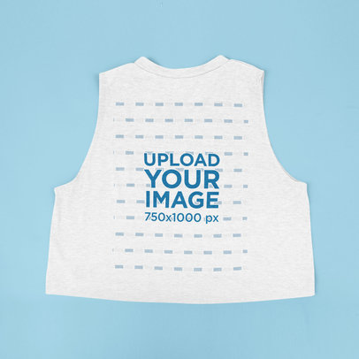 Back View Mockup Featuring a Crop Tank Top Placed on a Colored Surface 43275