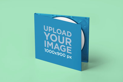 Mockup of a CD Inside a Digipack Standing on a Colored Setting 4931-el1