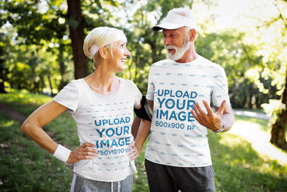 T-Shirt Mockup Featuring a Fitness Senior Couple in the Forest 