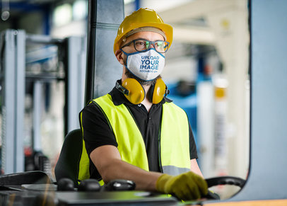 Face Mask Mockup Featuring a Serious Warehouse Worker 