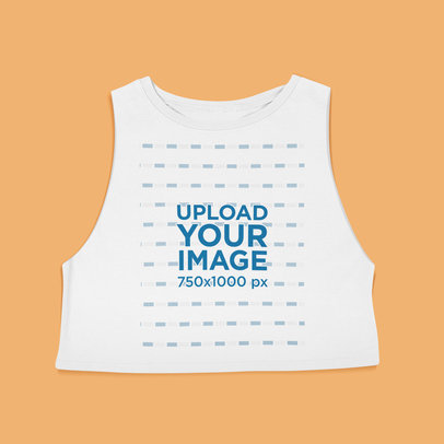 Mockup of a Sleeveless Crop Top Laid Flat on a Surface