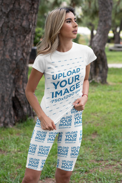 T-Shirt and Bike Shorts Mockup of a Woman at a Park