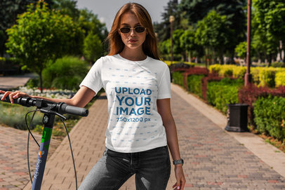 T-Shirt Mockup of a Woman Using a Scooter