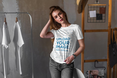 Mockup of a Woman Wearing a T-Shirt in a Small Boutique