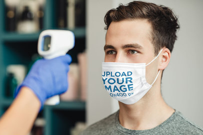 Face Mask Mockup Featuring a Young Man