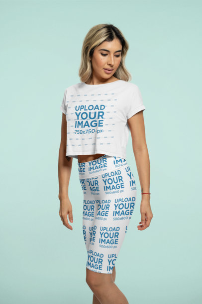 Crop Top Mockup Featuring a Serious Woman Wearing Sublimated Bike Shorts at a Studio 42346