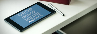 Wide Mockup of a Nexus 7 in Landscape Position at a Workstation