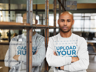 Sweatshirt Mockup of a Man Leaning on a Windowpane
