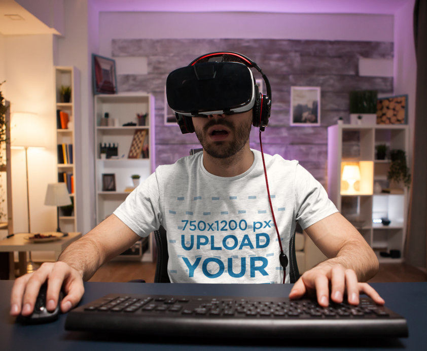 Placeit - T-Shirt Mockup of a Man Playing a VR Computer Game