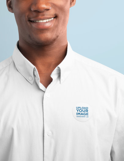 Mockup of a Man with a Sticker Attached to His Shirt