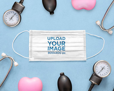 Mockup Featuring a Face Mask Surrounded by Medical Devices 