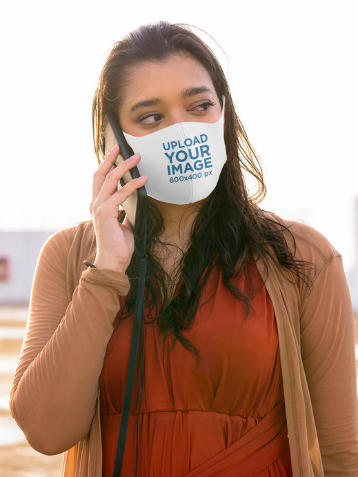 Face Mask Mockup Featuring a Woman Making a Call 