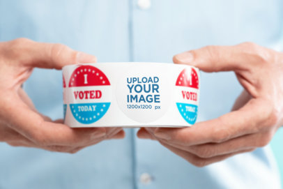 Voting-Themed Mockup of a Man Holding a Roll of Stickers