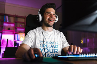 Mockup of a Gamer Wearing a Basic T-Shirt at Home 