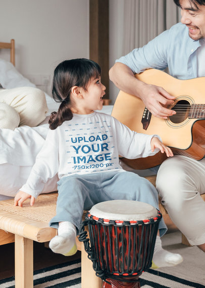 Long Sleeve Tee Mockup Featuring a Little Girl Having Fun With Her Dad