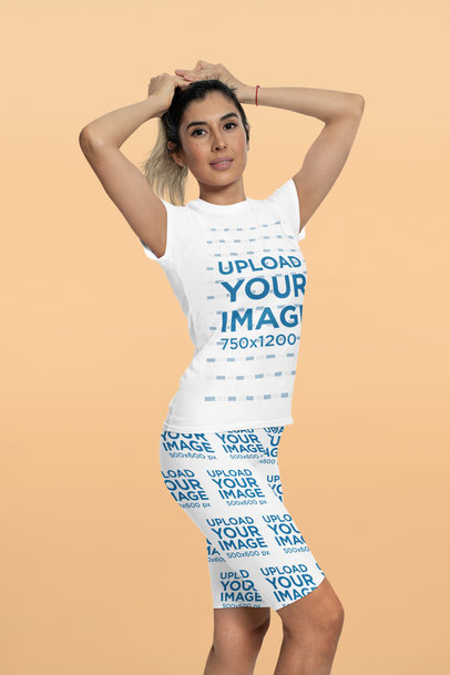 T-Shirt and Bike Shorts Mockup of a Woman Grabbing Her Hair