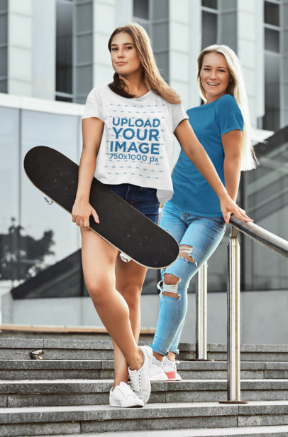 T-Shirt Mockup Featuring Two Young Women Posing on the Stairs 