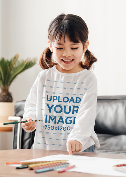 Mockup of a Little Girl Drawing in the Living Room