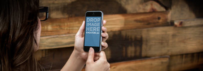 Wide Mockup of an iPhone 5C Featuring a Woman