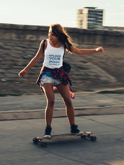 Tank Top Mockup of a Cool Woman Riding a Longboard